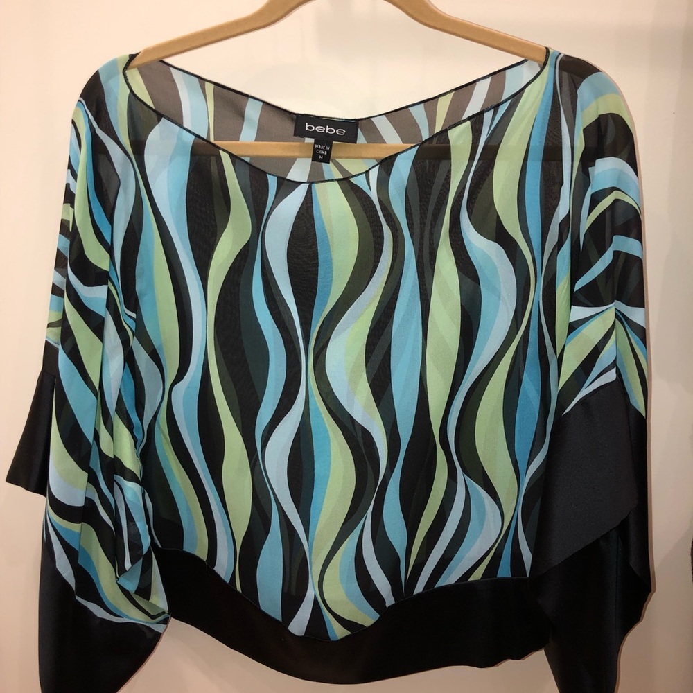 Bebe Chiffon top in excellent condition.